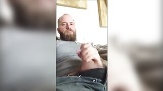 White bear stroking huge cock