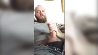 White bear stroking huge cock