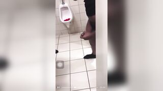 Group of horny guys stroking their cock in public toilet