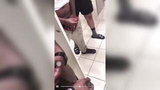 Group of horny guys stroking their cock in public toilet