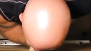 Bald gay eating a tasty smooth white cock thru a glory hole