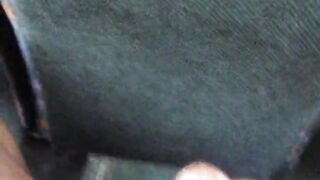 Black guy wanking his huge dick at a public buss and shooting a big load
