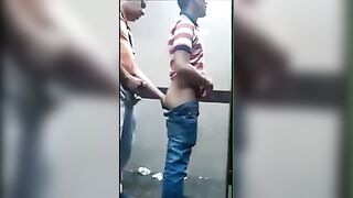 Watching how two strangers have sex in a public bathroom