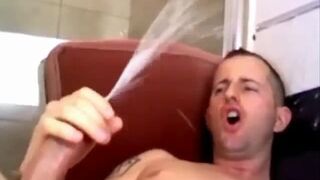 Horny dude having a huge orgasm and shooting a huge load