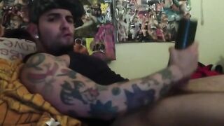 Cute tattooed skater using his new toy to masturbate