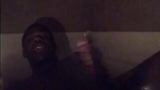 Cute black dude having fun stroking his huge cock