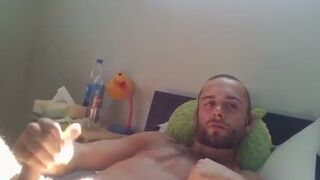 Cute bearded european beating a tasty fist