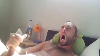 Cute bearded european beating a tasty fist