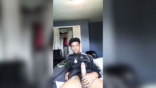 Cute black twink stroking his long tasty cock