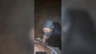 Masked black guy swallowing the cum from a huge thick cock in the middle of the street