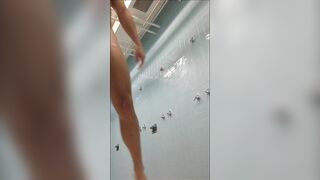 Hot stud masturbating while taking a shower at the gym