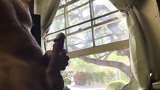 Masturbating in front of the window