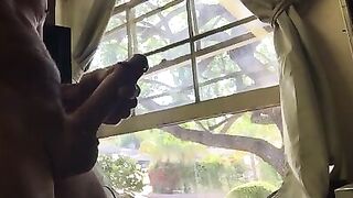 Masturbating in front of the window