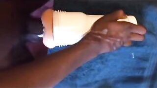 Black guy using his new toy while shooting a huge load