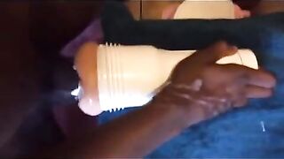 Black guy using his new toy while shooting a huge load