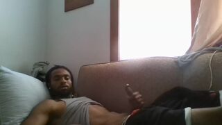 Hot jamaican dude wanking his cock on his sofa