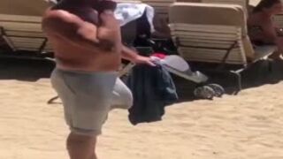 Dad's obscene beach bulge