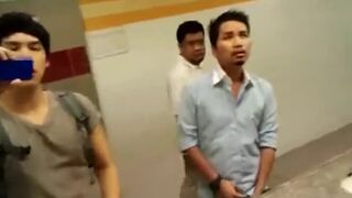 Group of guys rubbing their cock in a public bathroom