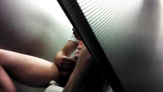 Stroking my cock at the airport bathroom