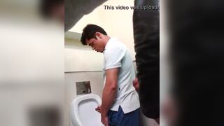 Spying on cute young guys masturbating in public toilets