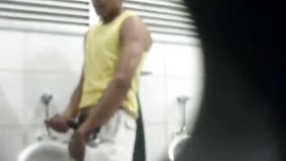 Spying on guys masturbating in public toilets