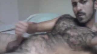 Horny arab bear rubbing his cock in front of the webcam