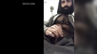 Hairy bearded bear strokes his cock outdoor