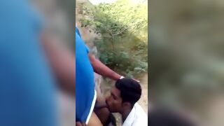 Asian guy sucking his landlord's cock outdoor