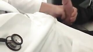 Doctor works his cock at work