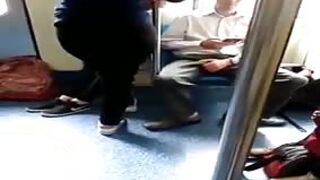 Horny boy plays his dick through pants on the train