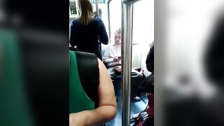 Horny boy plays his dick through pants on the train